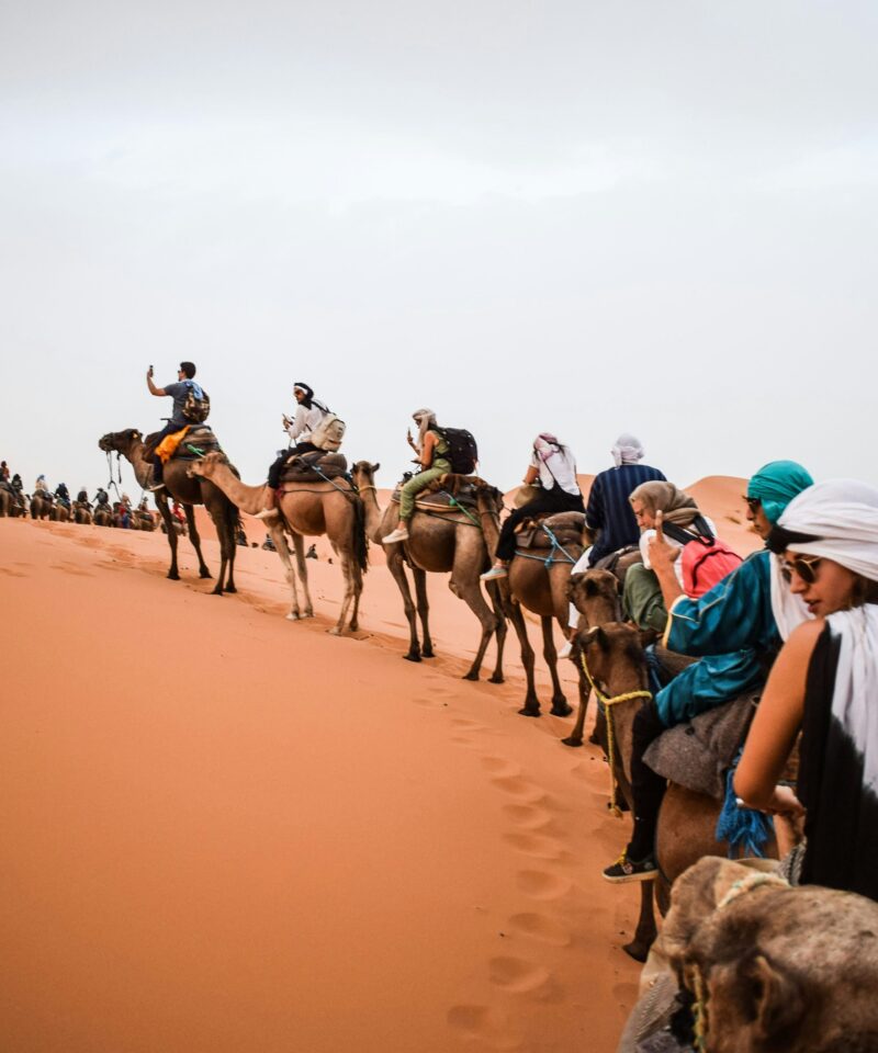 Camel ride in Merzouga sand dunes during a 4-day Fez to Sahara Desert tour, Morocco